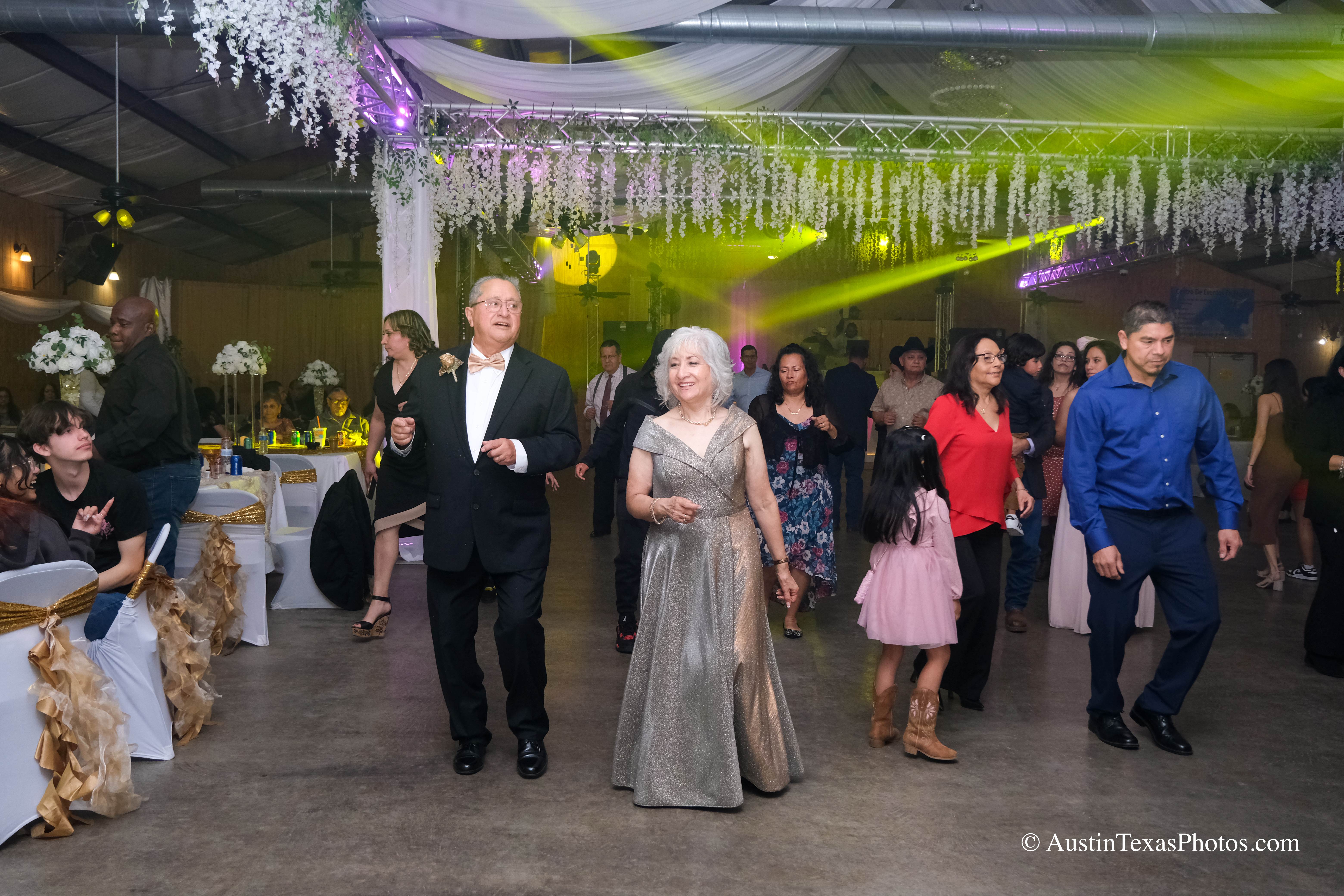 Bride and groom dancing together at wedding reception