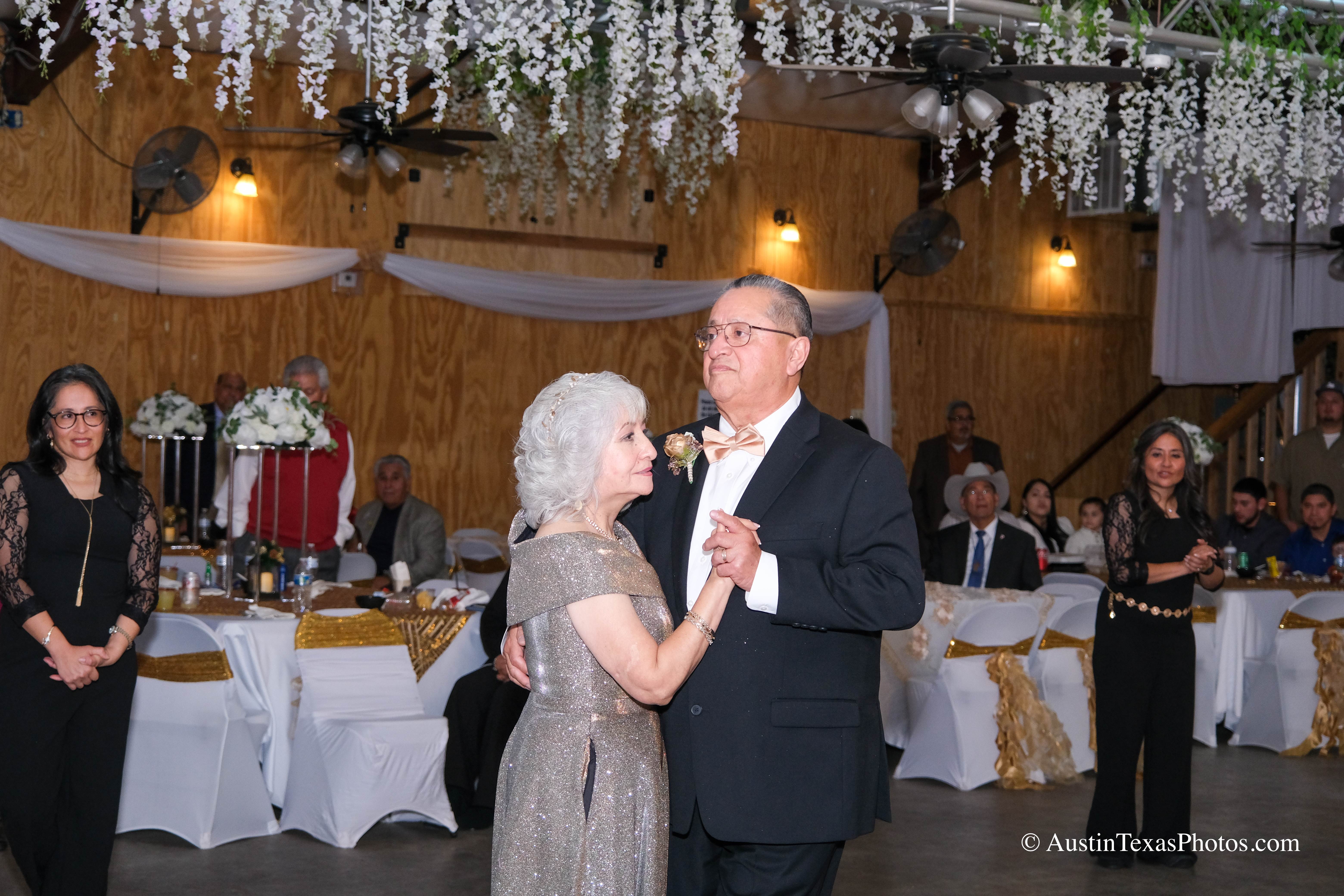 Bride and groom first dance close-up at wedding reception
