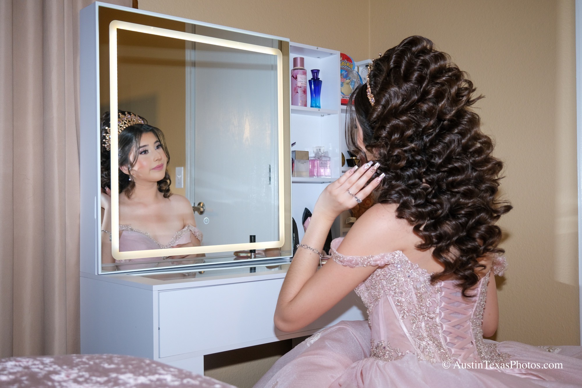 Quinceañera getting ready before the event
