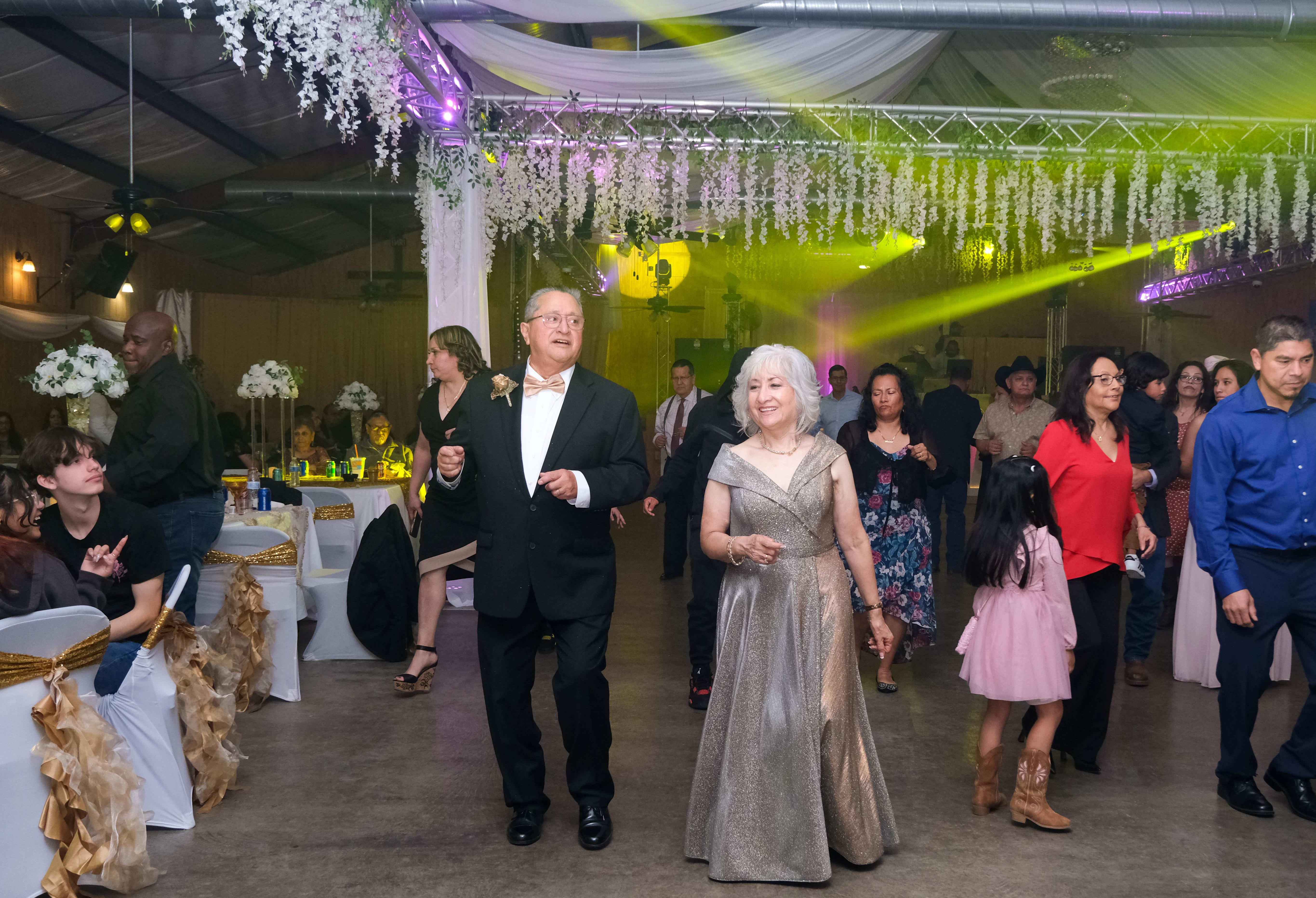 Bride and groom dancing together at wedding reception