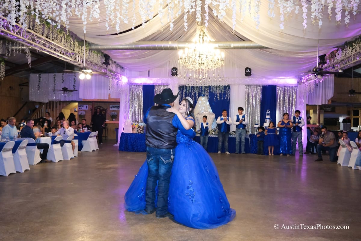 Quinceañera waltz moment captured at an Austin area reception hall