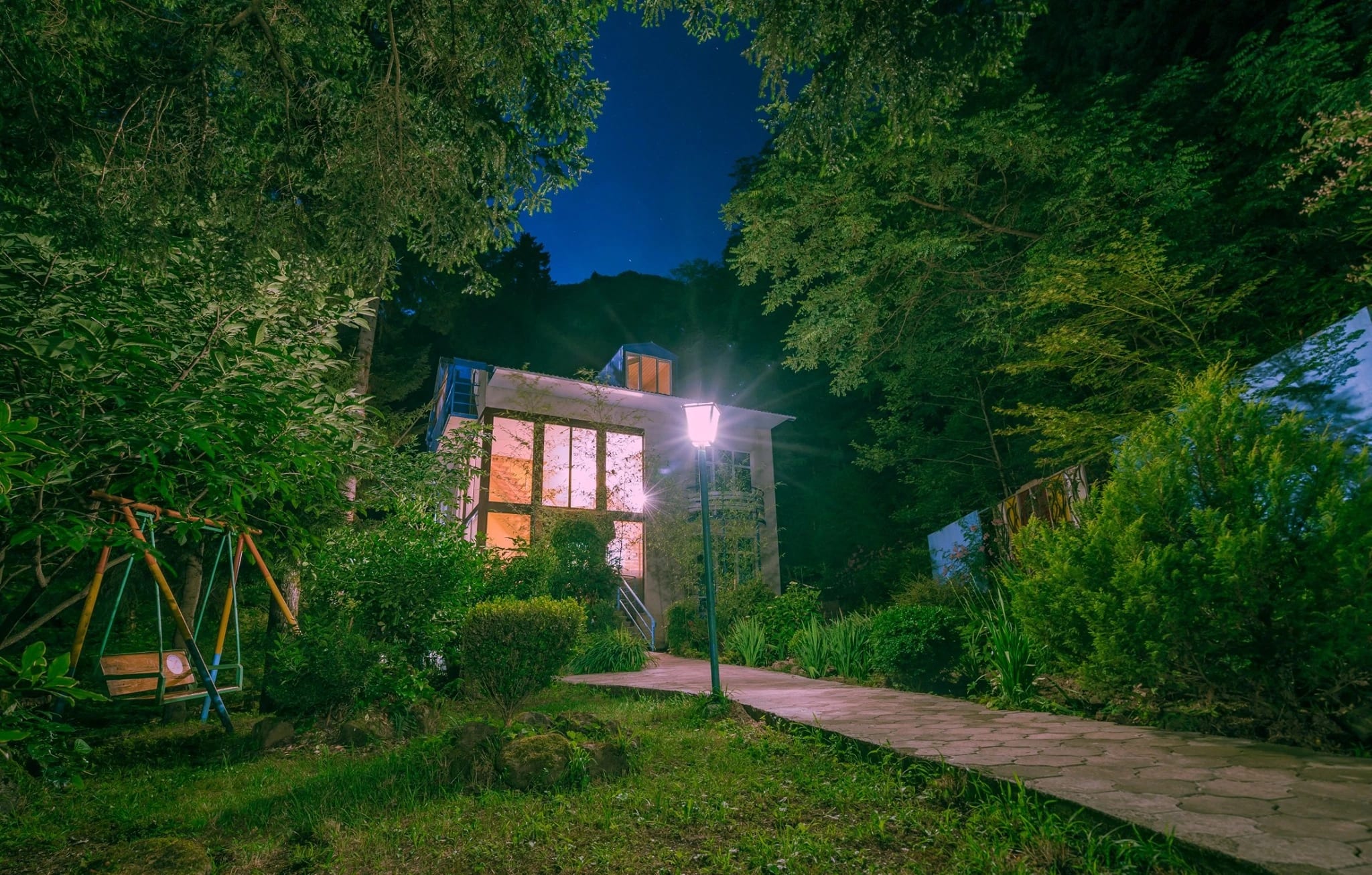 The main house at night