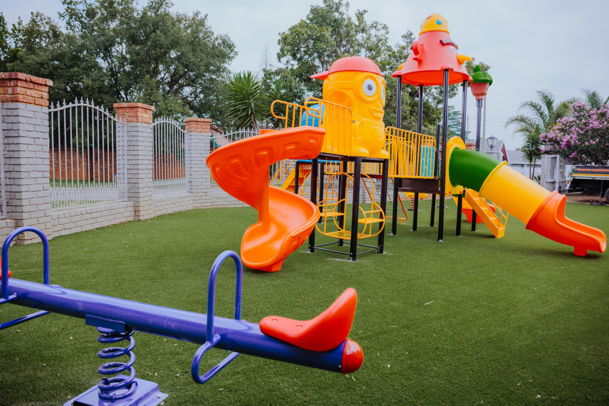 NBCFC Kids outdoor playground with slides and play structures