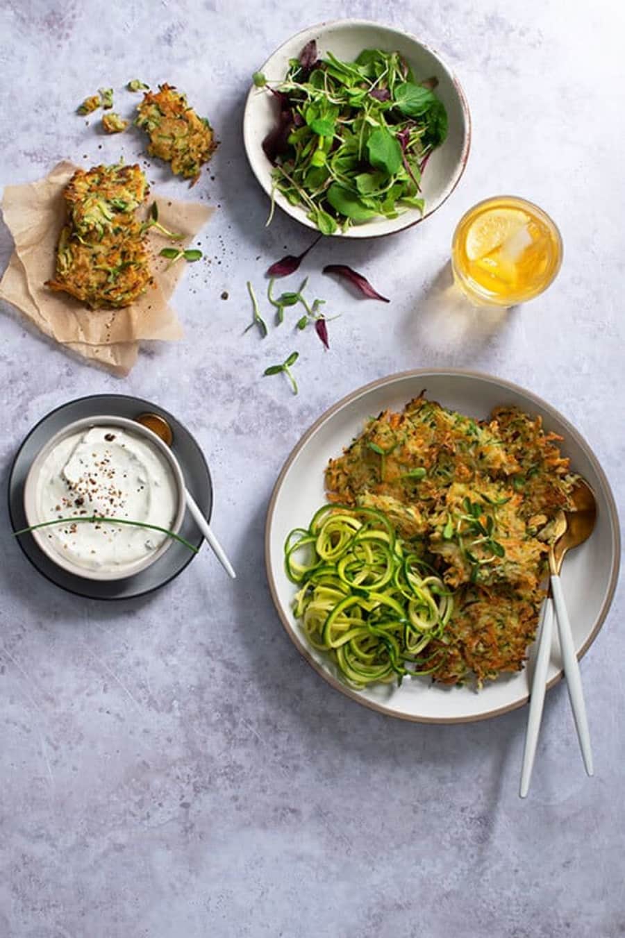 Zucchini and Spring Onion Rice Fritters with Sour Cream and Chives main image