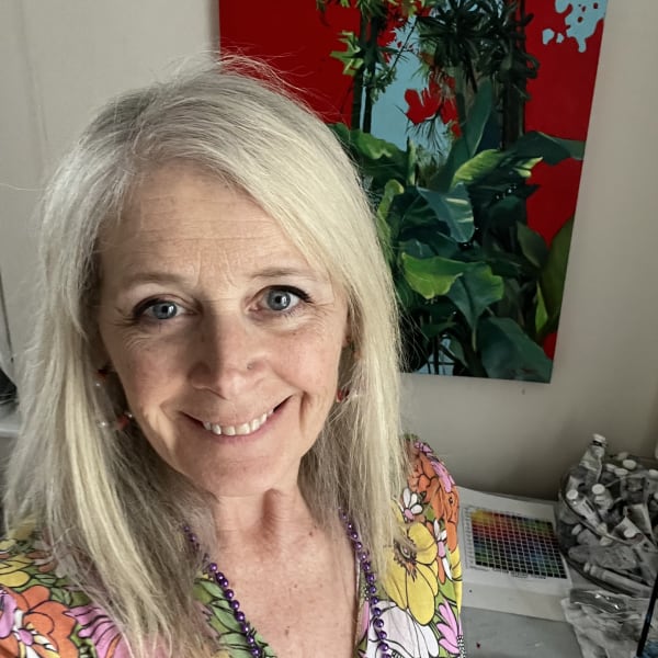 In my studio with one of my paintings behind me 