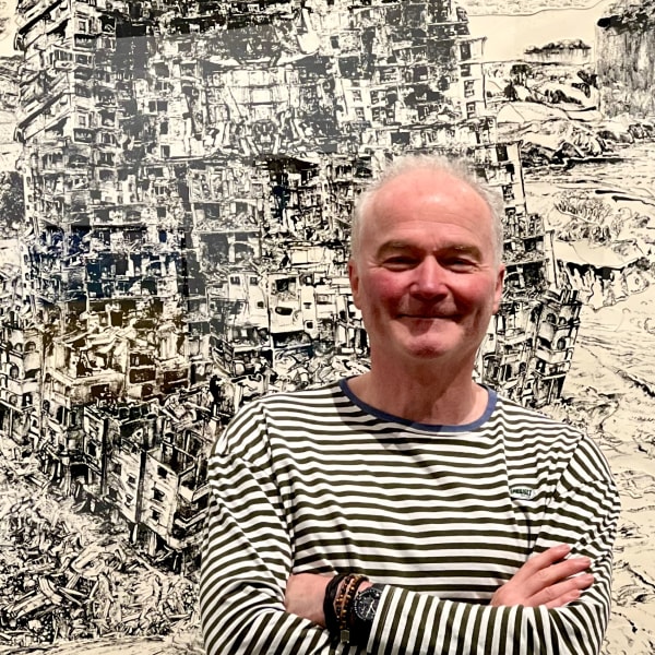 Simon Page in front of his work 'End of Babel'