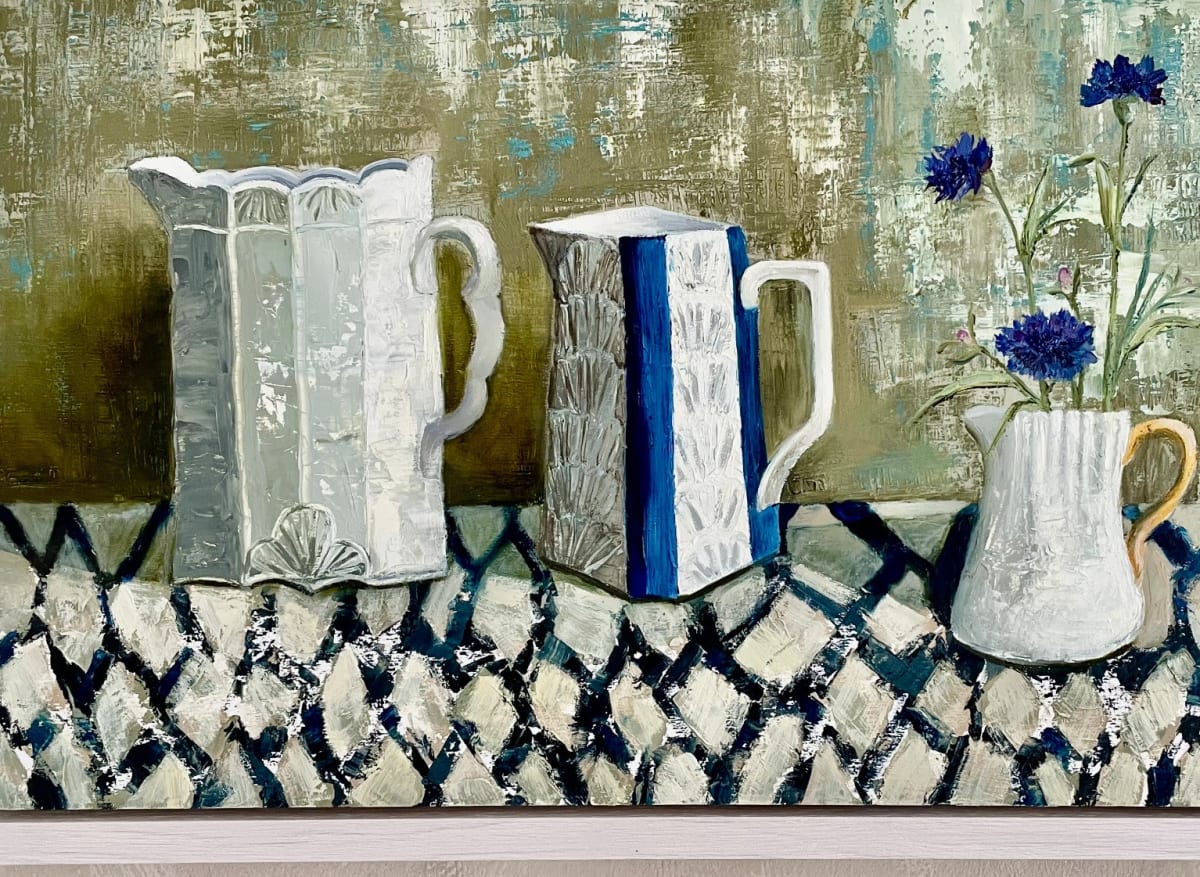 'The Last of the Cornflowers' is a medium sized oil painting featuring 3 antique jugs in white, blues and greens