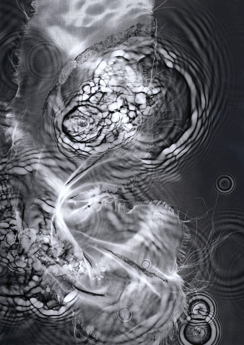 'Lingering Belief', alternative cameraless photography, b/w watergram of ripples from sacred spring water and votive, by Paeony Lewis