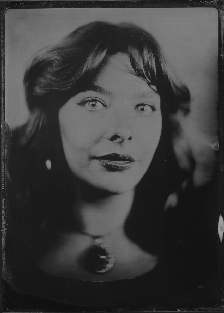 A studio-shot 5 x 4 tintype