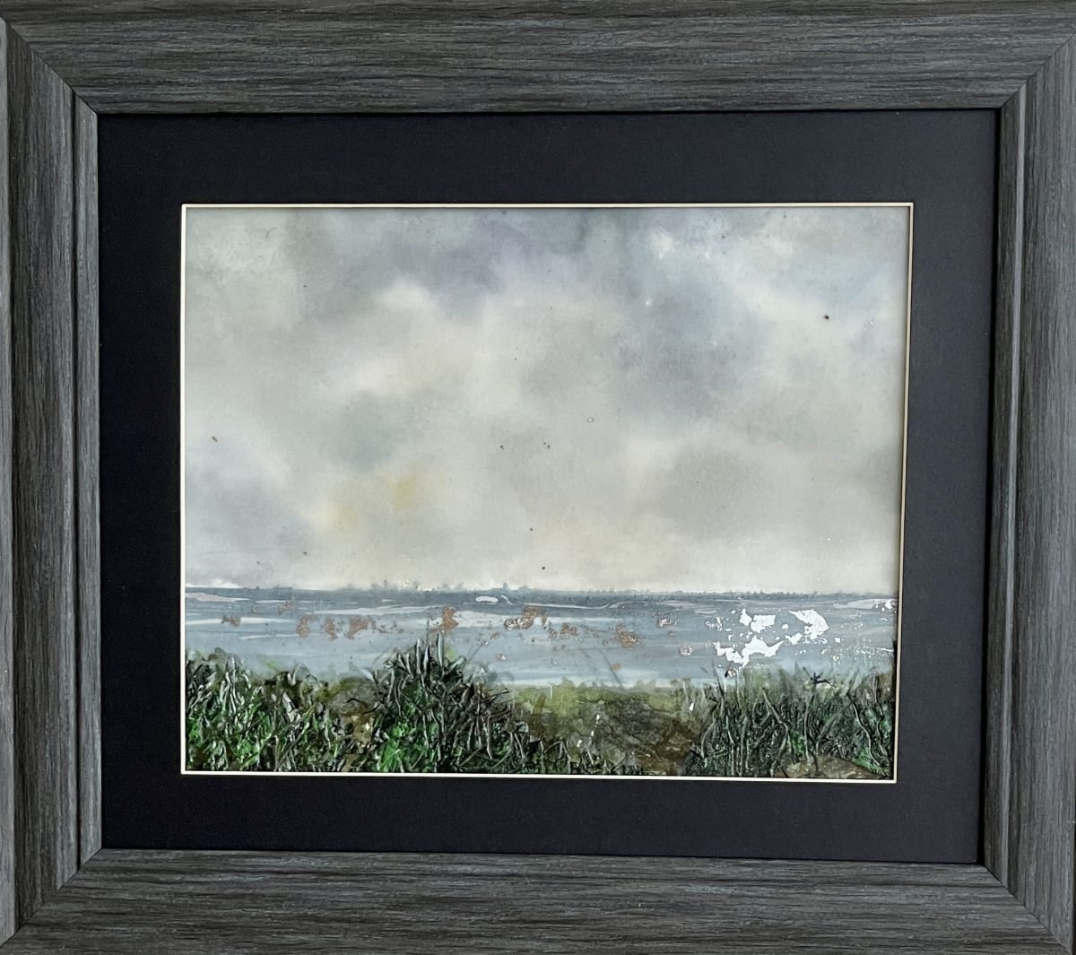 Encaustic over watercolours incorporating silver leaf. View from the greensward over looking the sea at Frinton On Sea