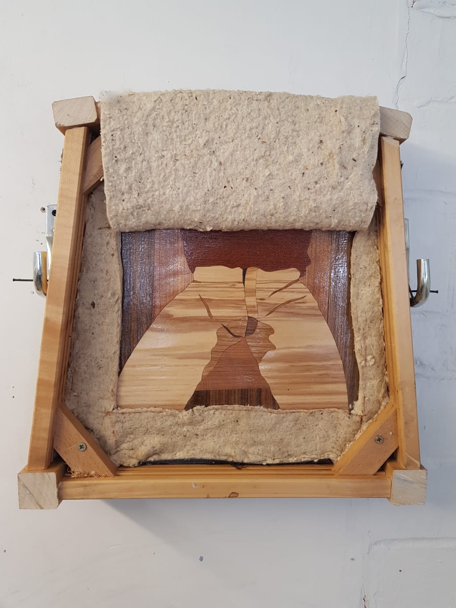 piss pants by Jay Potrykus - Mixed wood and varnish, framed in a pub stool