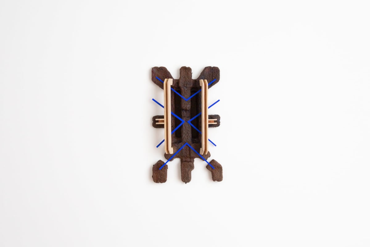 Project X, 2023. Poplar, sapele, paper pulp, paint, paper, MDF, magnets, reflective stickers. 33 × 19 × 7 cm — Jon Kipps