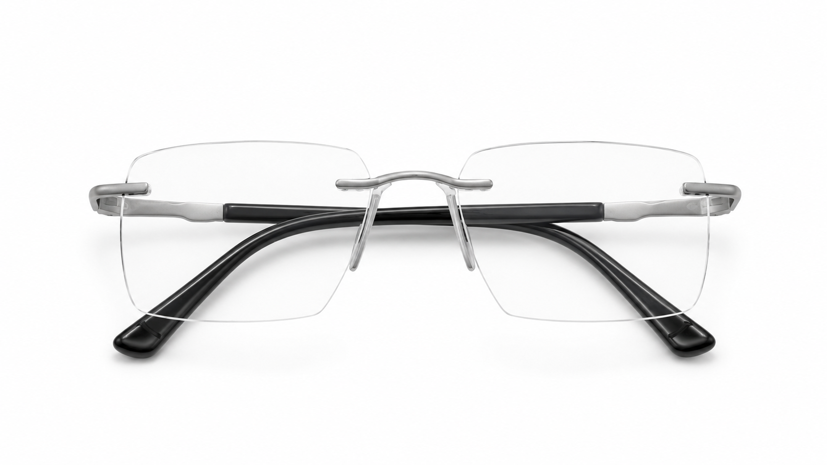 نظارة ريفال (Rival) الطبية بدون إطار (Rimless) بتصميم مستطيل باللون الفضي، مناسبة للجنسين وتلائم الوجوه الدائرية والبيضاوية والقلبية والمربعة.