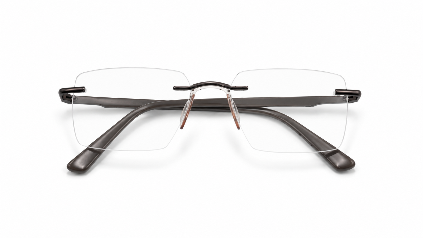 نظارة ريفال (Rival) الطبية بدون إطار (Rimless) بتصميم مستطيل باللون البرونز، مناسبة للجنسين وتلائم الوجوه الدائرية والبيضاوية والقلبية والمربعة.