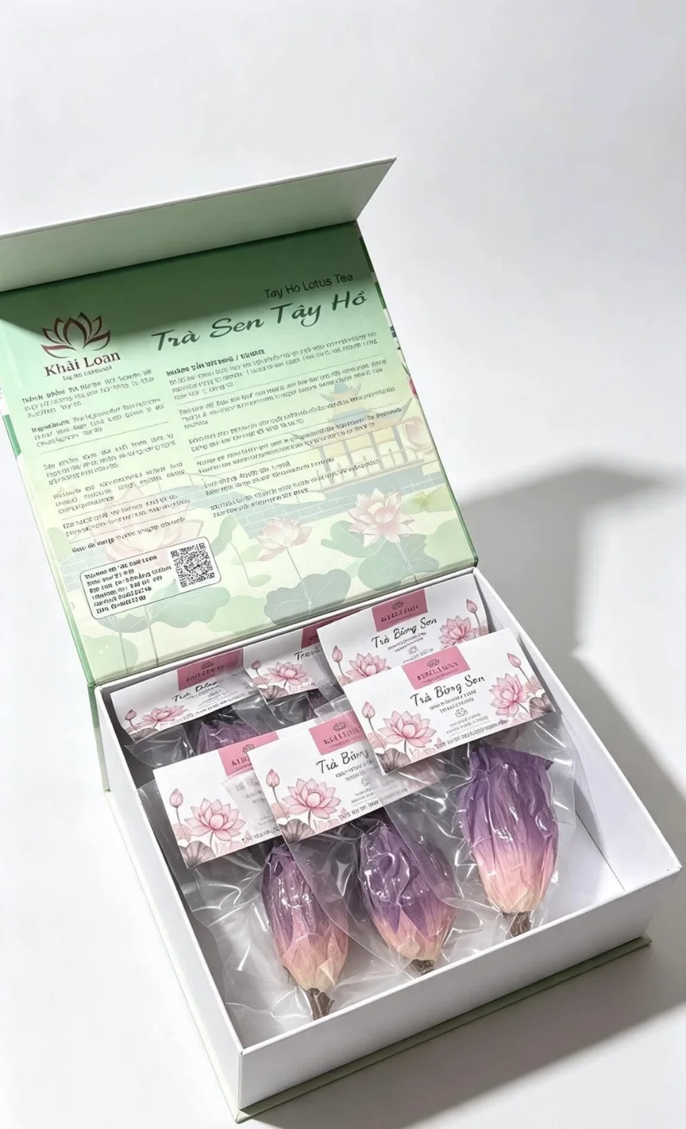 Editorial close-up still life photograph of an artisanal gift box of Khải Loan freeze-dried lotus tea