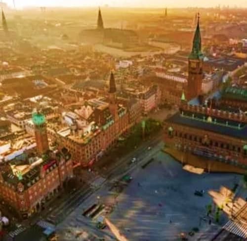 Aerial view of Moscow's Red Square with Kremlin towers and historic buildings at sunset