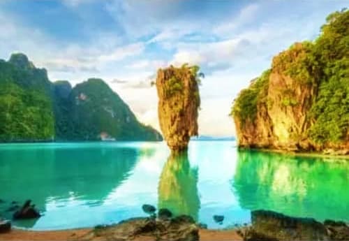 Khao Phing Kan limestone rock formation rising from turquoise waters in Phang Nga Bay, Thailand