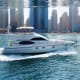 White luxury yacht cruising on water with Manhattan skyline in background