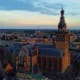 Aerial view of Groningen city center with historic red brick church and tower at sunset, Netherlands