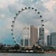 London Eye observation wheel with Singapore skyline and Marina Bay waterfront