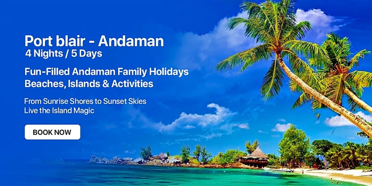 Tropical beach in Port Blair, Andaman Islands with palm trees, turquoise water, white sand, and traditional huts under blue s