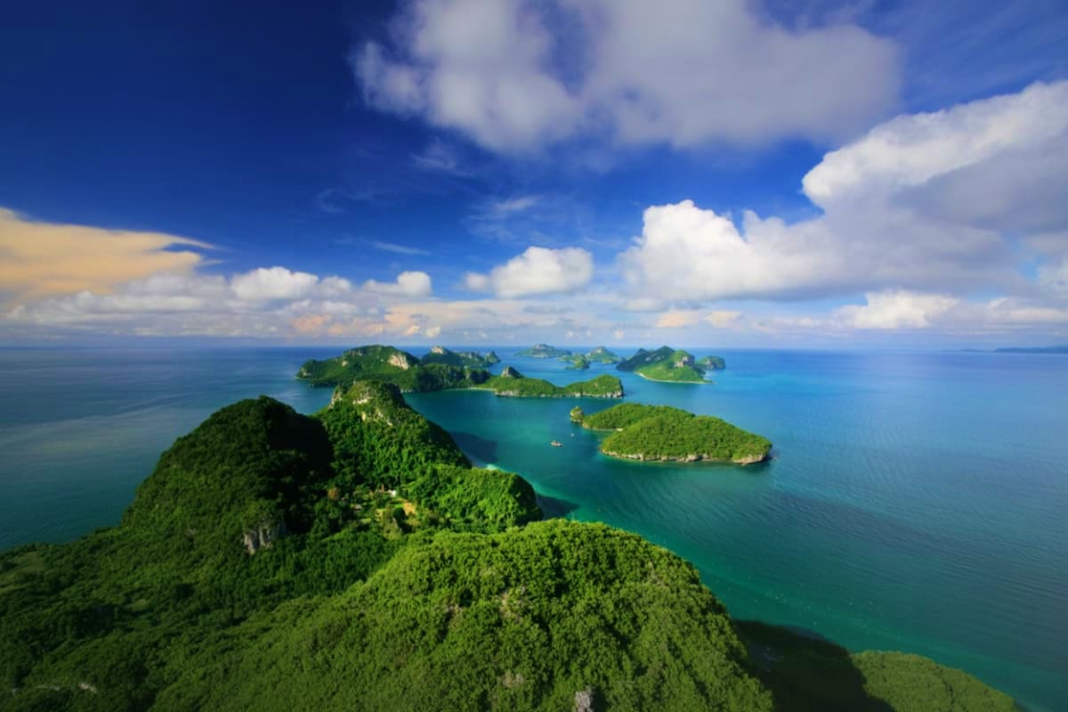 Angthong National Marine Park by Big Boat Aerial view of turquoise waters and lush forested islands in Angthong National Marine Park, Thailand