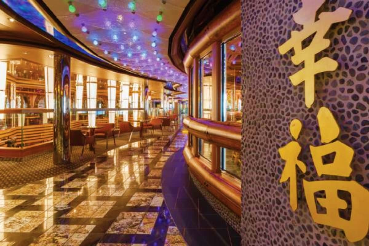 Modern cruise ship corridor with purple ambient lighting, gold Asian characters on textured wall, and polished floor reflecti