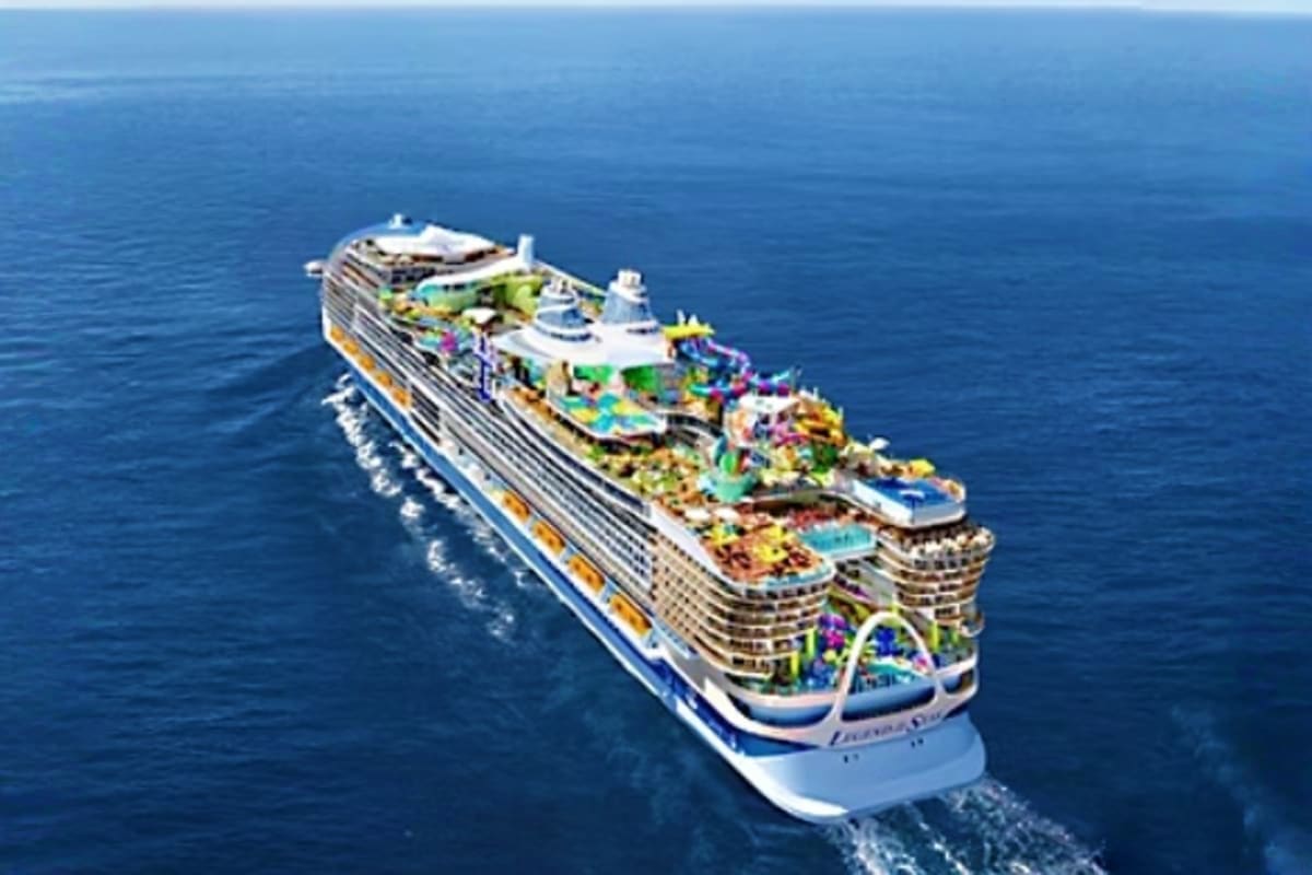 Aerial view of Legend of the Seas cruise ship sailing on blue ocean water with deck amenities visible
