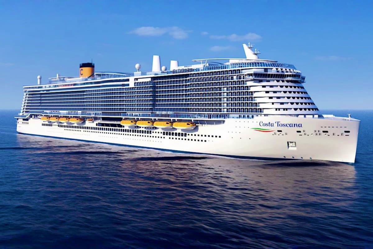 Costa Toscana cruise ship sailing on open ocean waters under clear blue sky