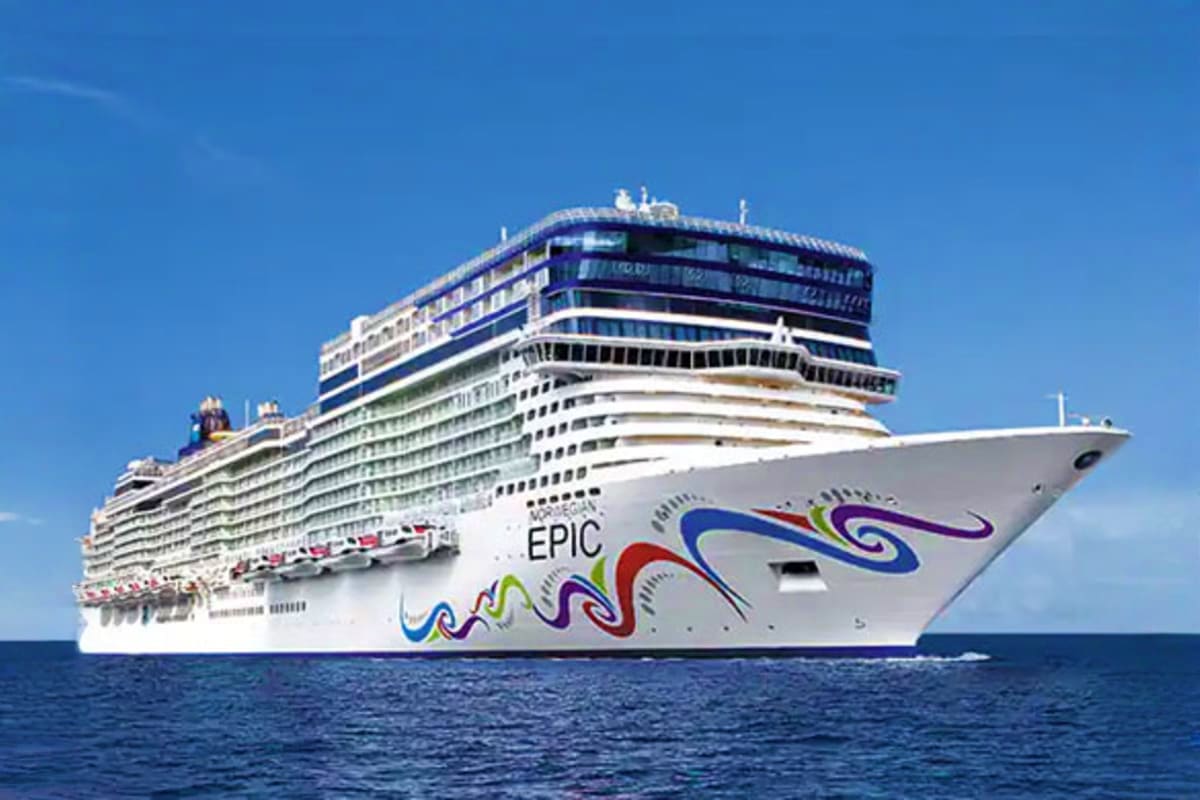 Norwegian Epic Southern Europe Cruise Norwegian Epic cruise ship with colorful hull design sailing on blue ocean under clear sky