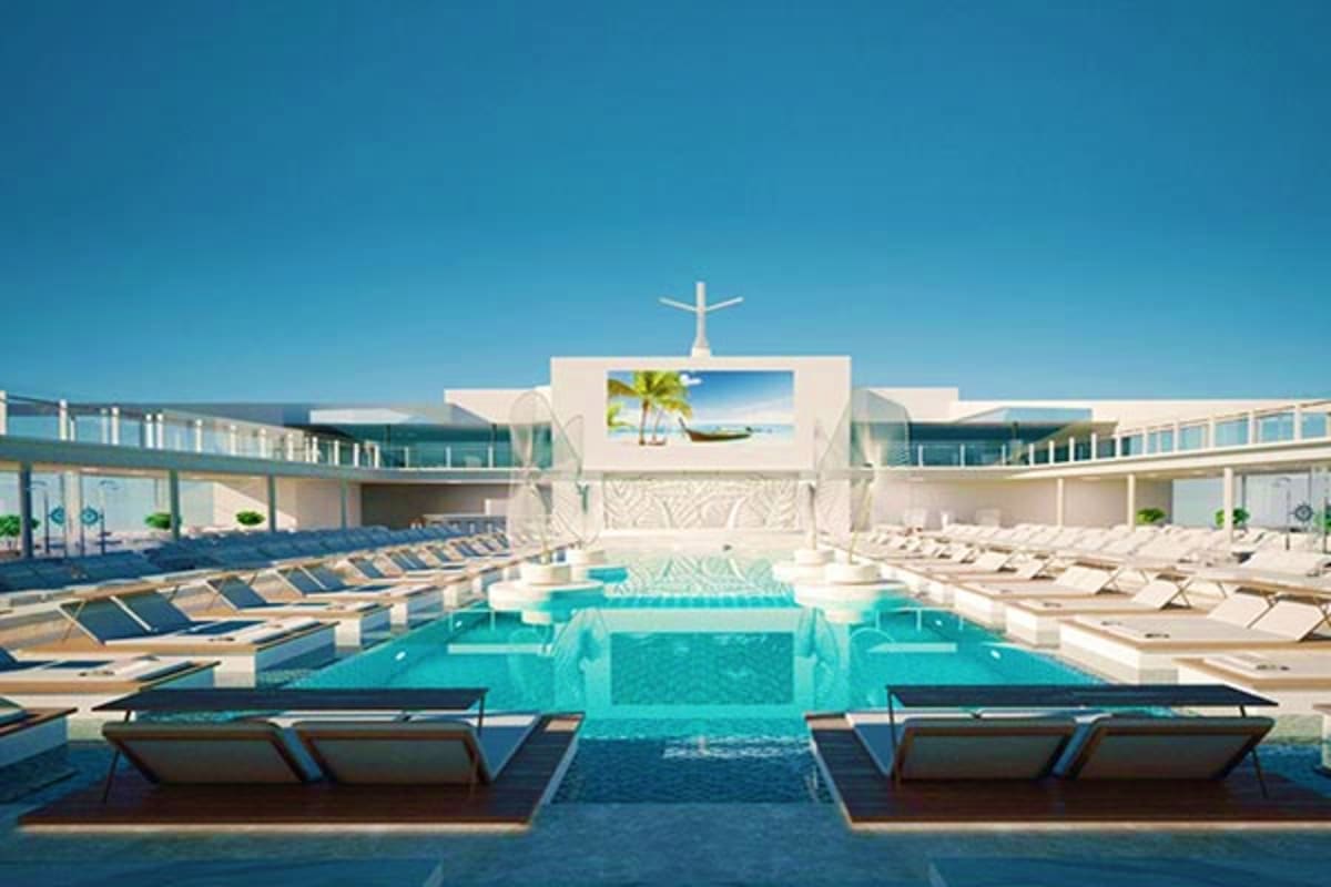 MSC Grandiosa cruise ship pool deck with turquoise swimming pool, lounge chairs, and white modern architecture with cross sym
