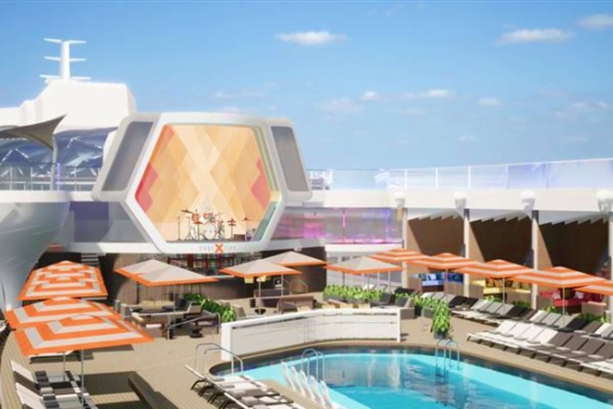 Celebrity Xcel cruise ship pool deck with blue swimming pool, orange and white umbrellas, lounge chairs, and modern geometric