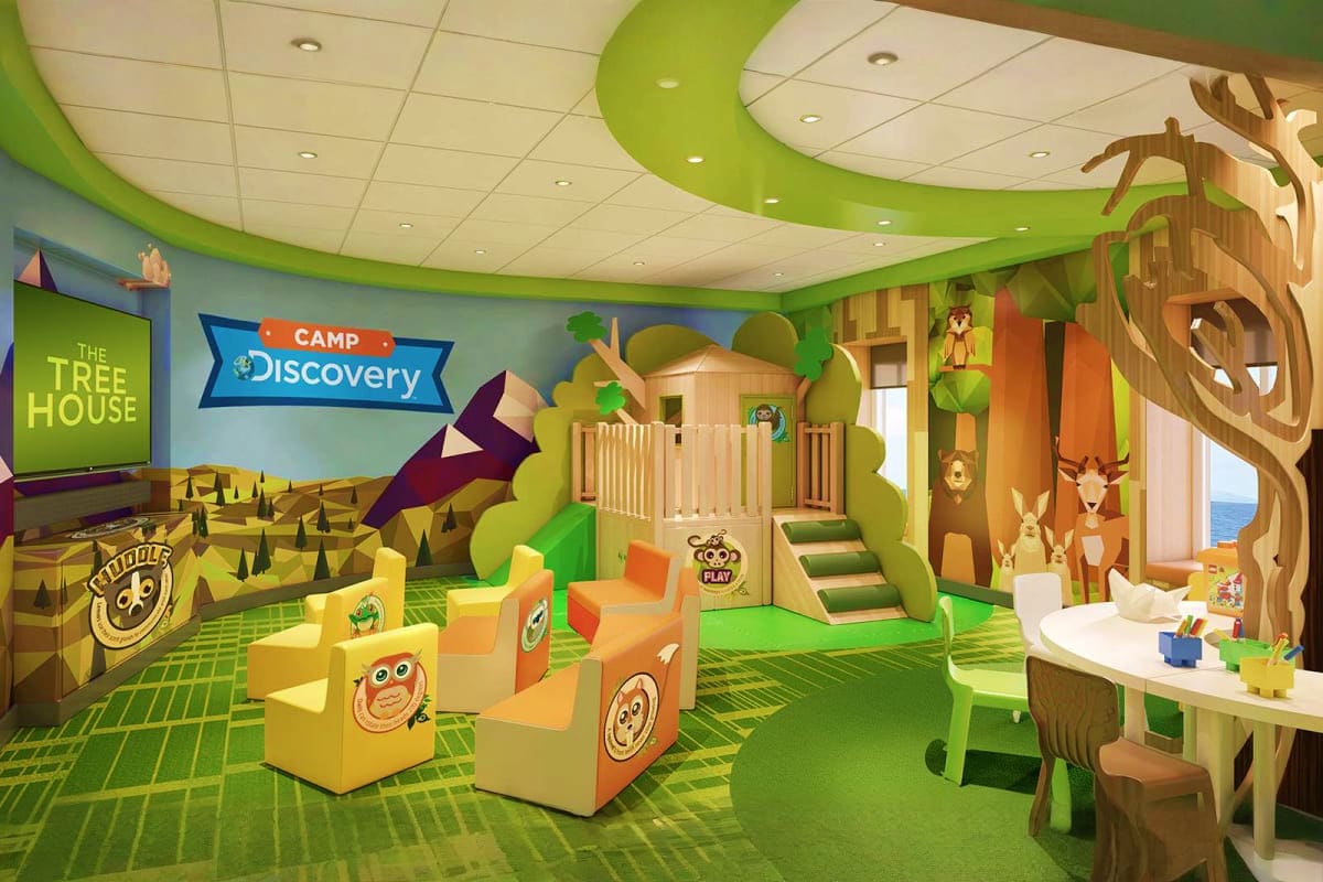 Camp Discovery kids club with tree house, colorful play structures, and interactive learning stations for children on Enchant