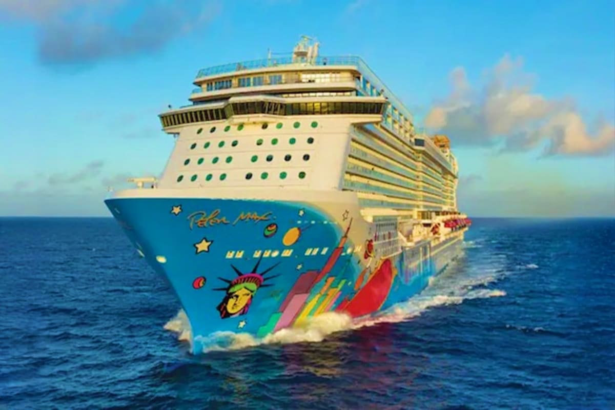 Norwegian Breakaway New England Escape Norwegian Breakaway cruise ship at sea with colorful bow featuring Statue of Liberty design and playful artwork