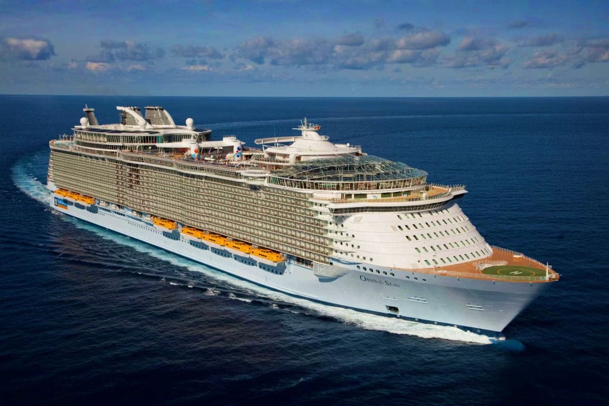 Oasis of the Seas cruise ship sailing on open ocean water under cloudy sky