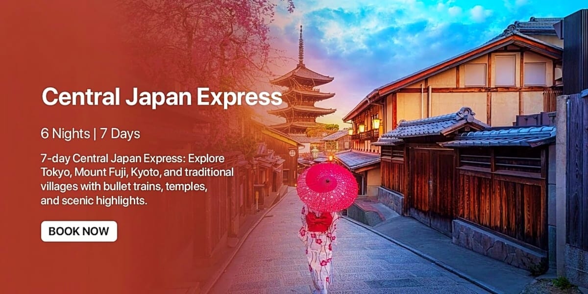 Woman holding pink umbrella walking through traditional Japanese street with pagoda temple and wooden buildings at sunset