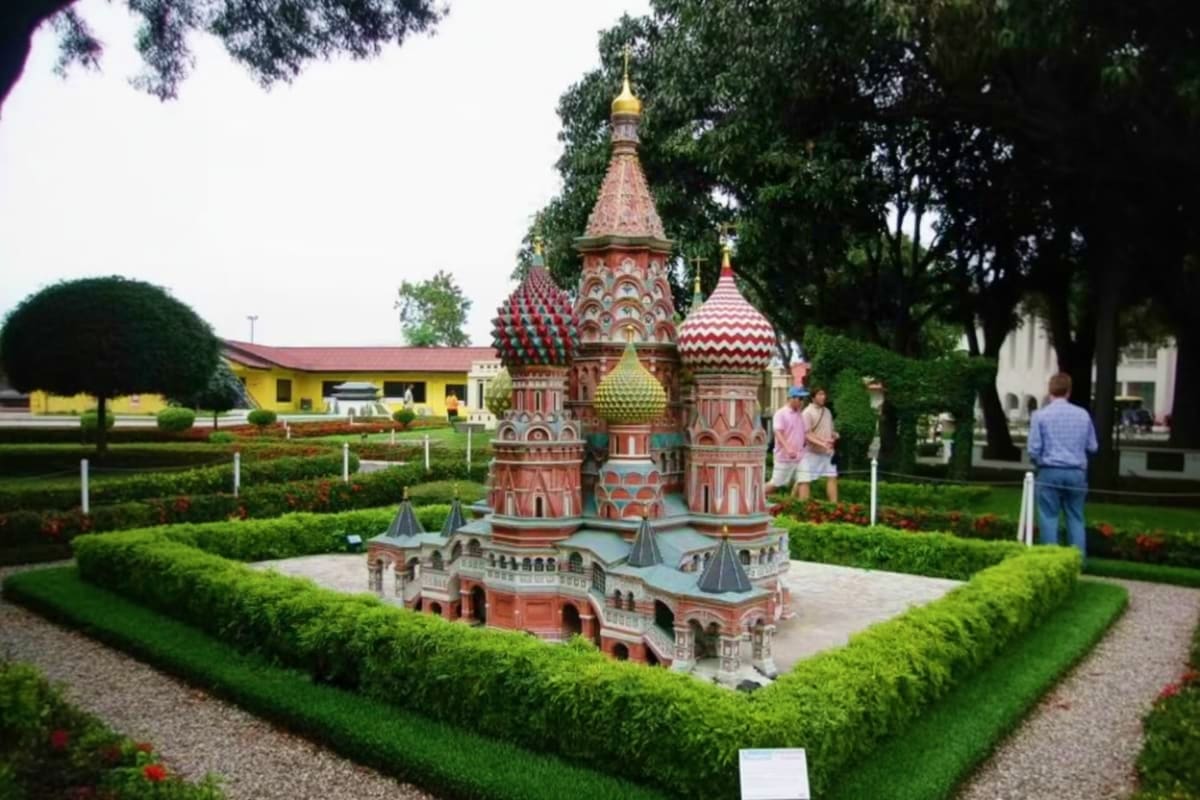Miniature replica of Saint Basil's Cathedral with onion domes and red brick architecture displayed at Mini Siam theme park in