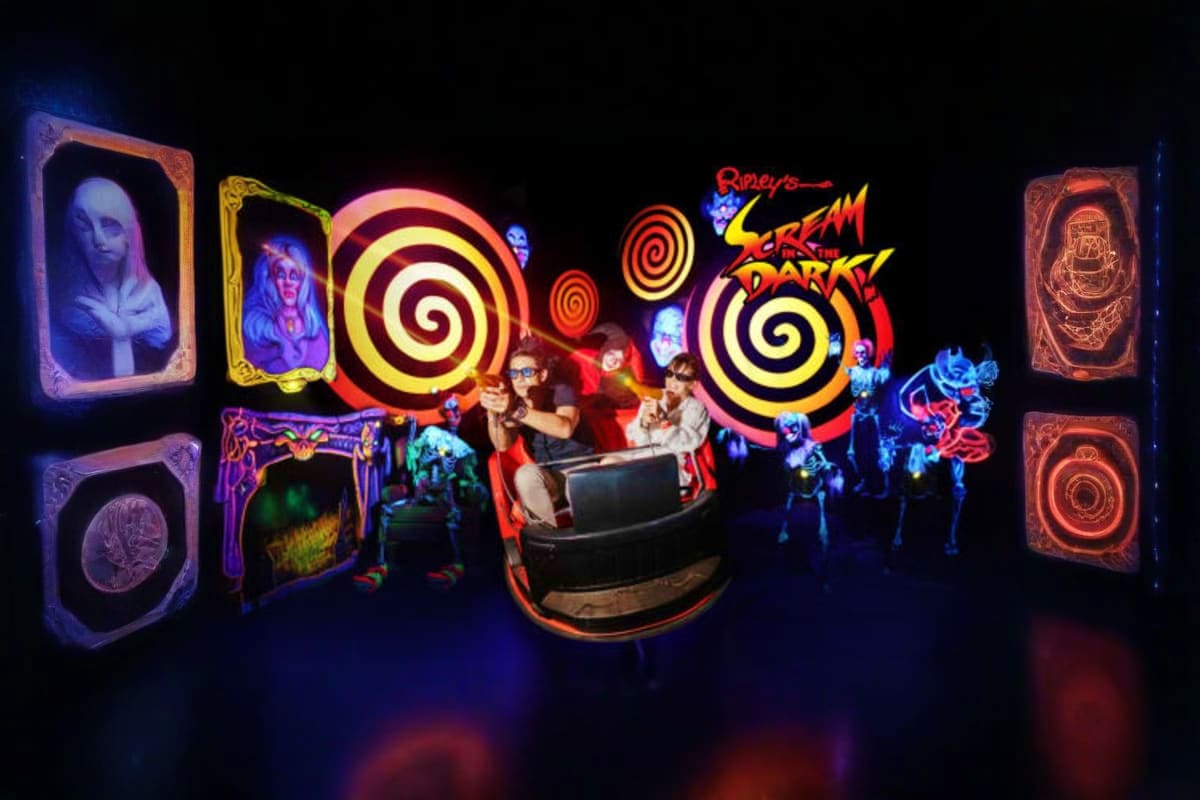 Ripley's Believe It or Not museum attraction with neon signs, vintage portraits, hypnotic spirals, and visitors exploring the
