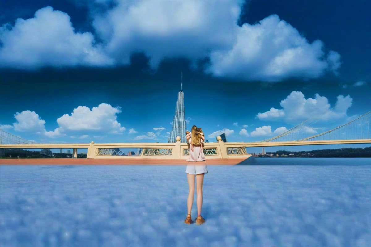 Woman holding camera standing in water with Burj Khalifa and bridge in background under blue sky