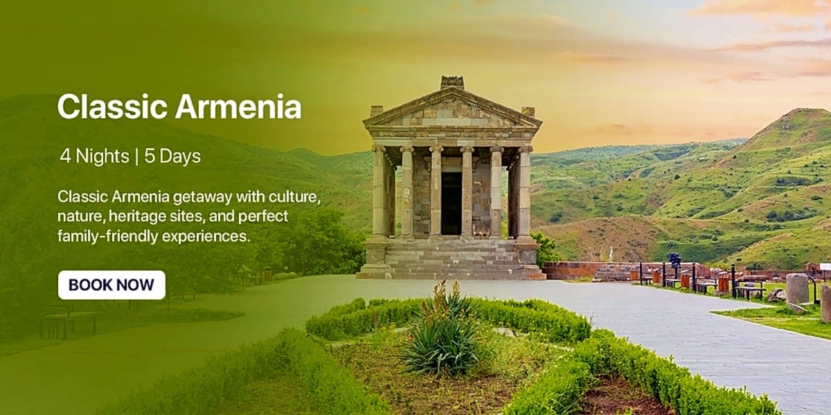 Ancient Greek temple with columns in Armenian mountain landscape and green valley with walking path