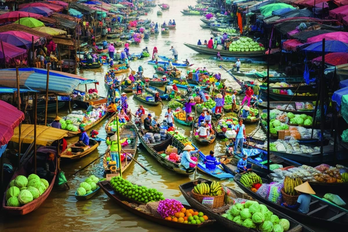 Mekong Delta My Tho City With Private Transfer Floating market in Mekong Delta with colorful boats loaded with fresh produce and vegetables, vendors, and wooden stalls with