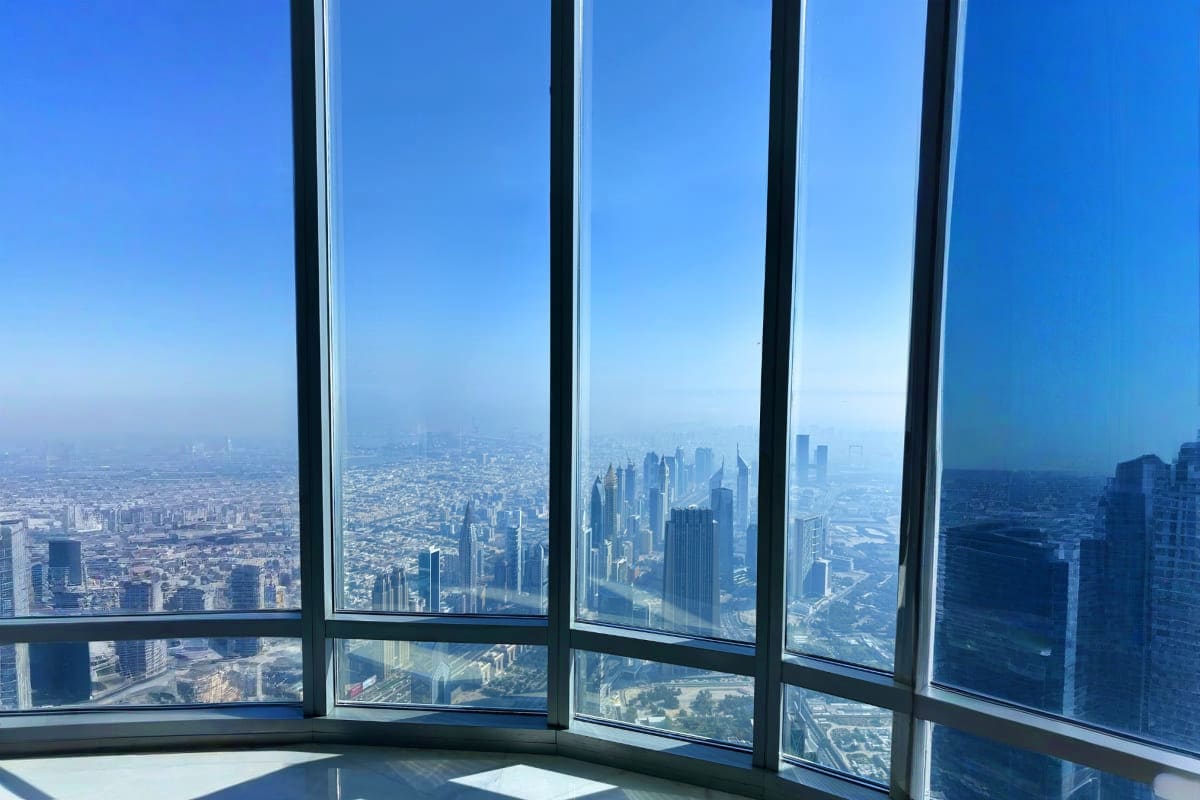 View of downtown Chicago skyline and surrounding cityscape from high-rise building windows