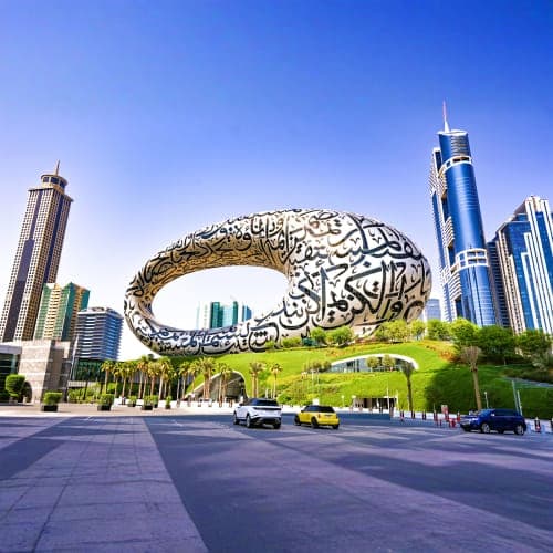 Museum of the Future futuristic architectural structure with Arabic calligraphy design in Dubai downtown skyline