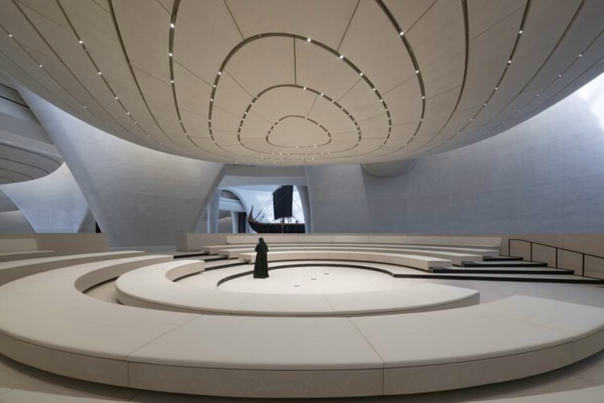 Zayed National Museum Modern circular interior of Zayed National Museum featuring concentric rings on ceiling with ambient lighting and minimalist