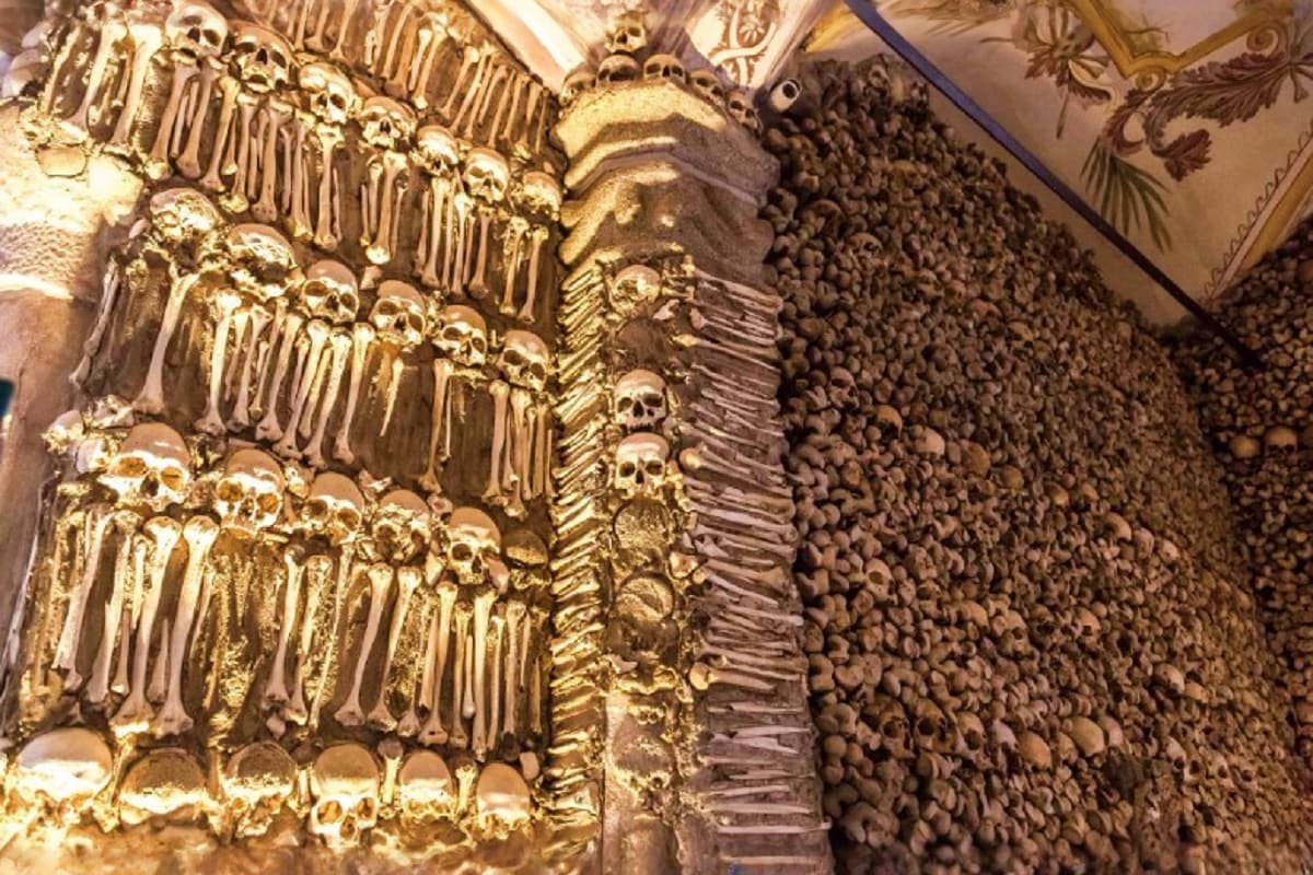 Ornate bone decorations and skull arrangements in the Capuchin Catacombs, a historic ossuary featuring skeletal remains artis