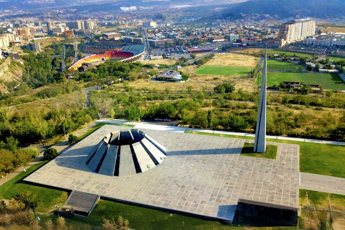 Aerial view of the Genocide Memorial complex in Yerevan, Armenia, with stadium and city in background