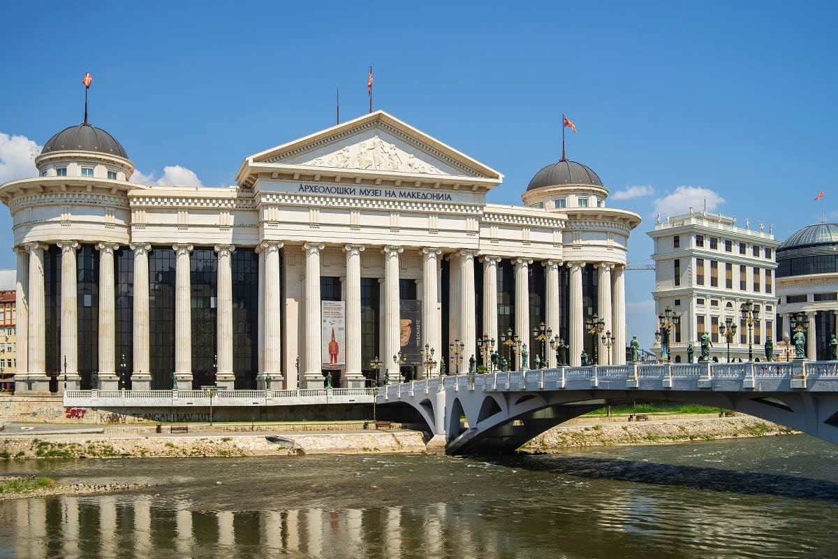 National Museum of Macedonia classical white building with columns and dome on Vardar River in Skopje, Macedonia
