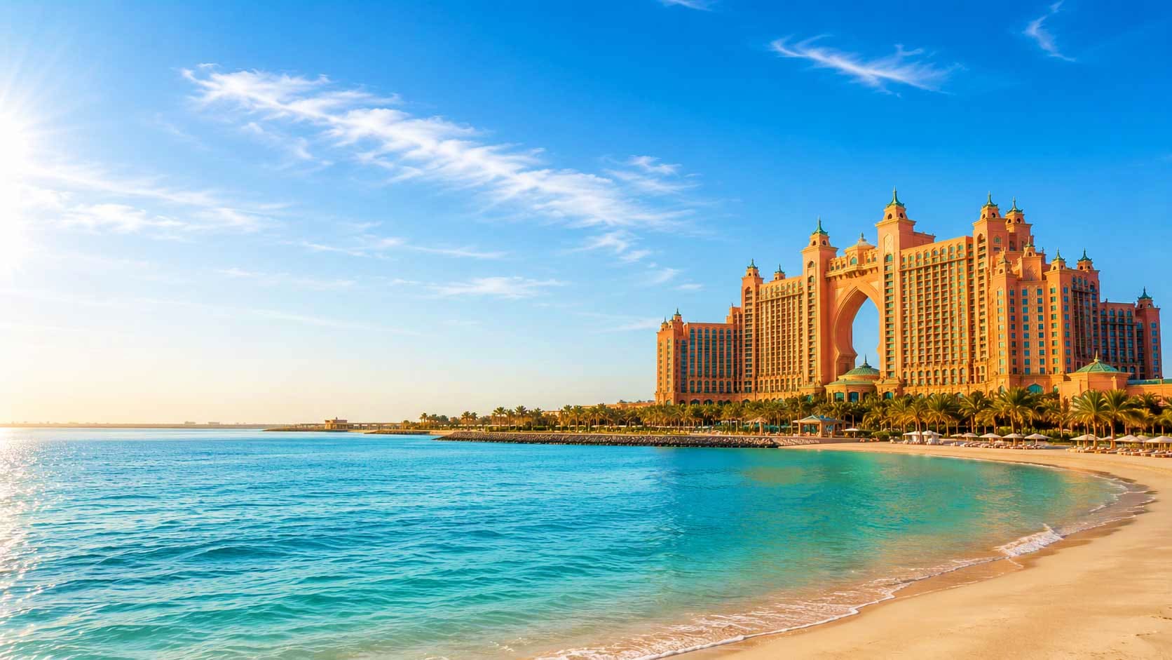 Atlantis The Palm luxury resort hotel on beach with turquoise Arabian Gulf waters in Dubai, UAE