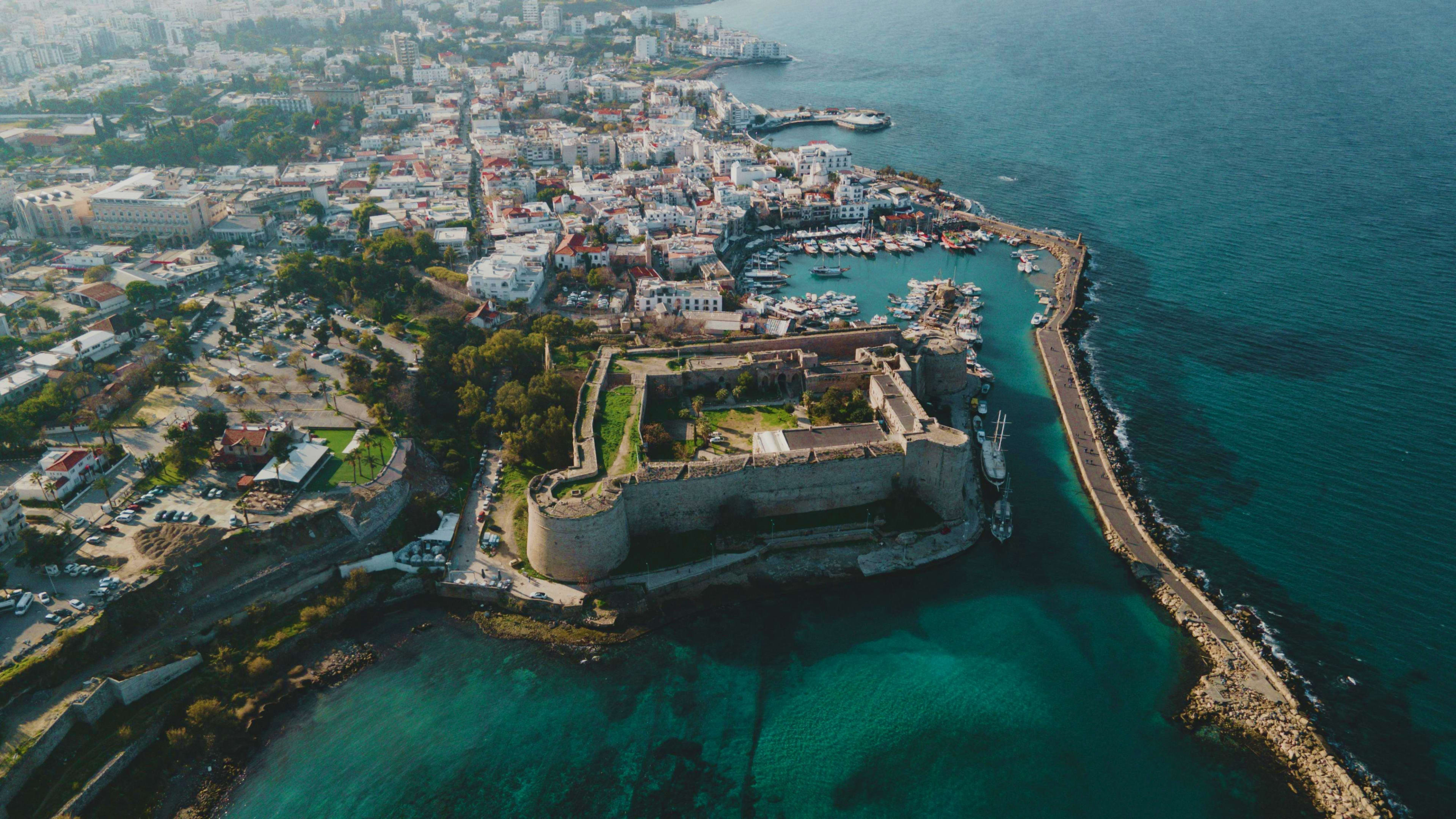 Cyprus Aerial view of Kyrenia Castle and harbor in Cyprus with turquoise Mediterranean Sea and white-washed buildings