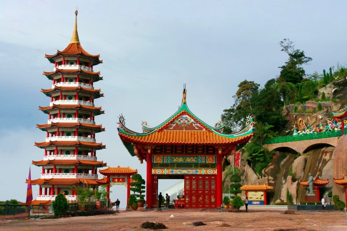Genting Highlands Tour with Awana Cable Car and Batu Caves Visit Traditional Chinese temple with golden roof pagoda and red ornamental gate at Genting Highlands, Malaysia